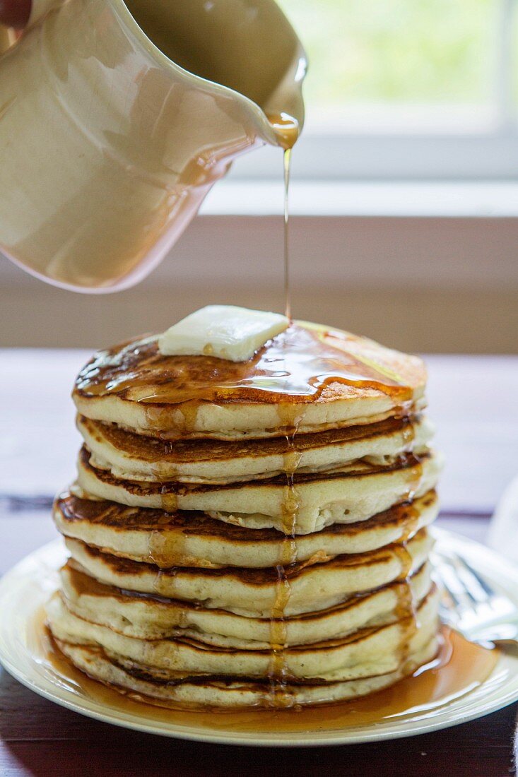 Pancakes with maple syrup and butter