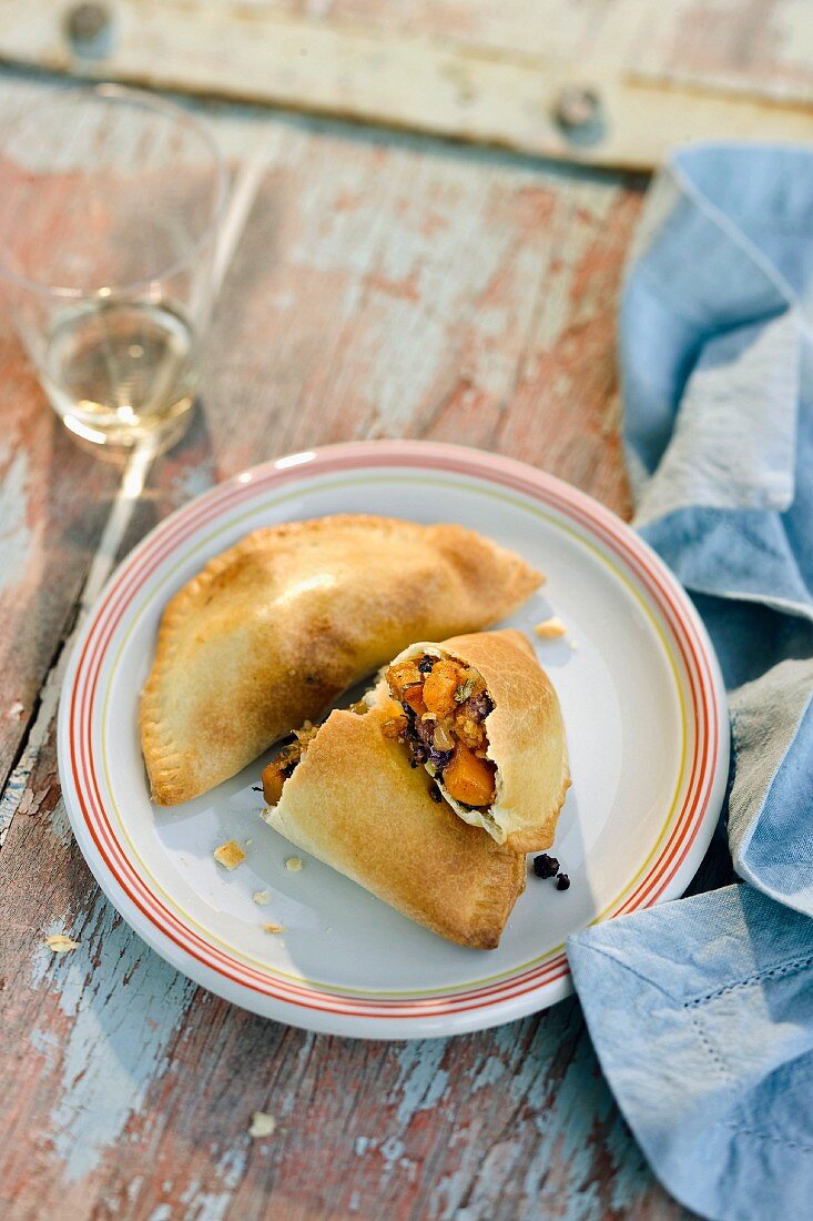 Pasties filled with pumpkin and currants