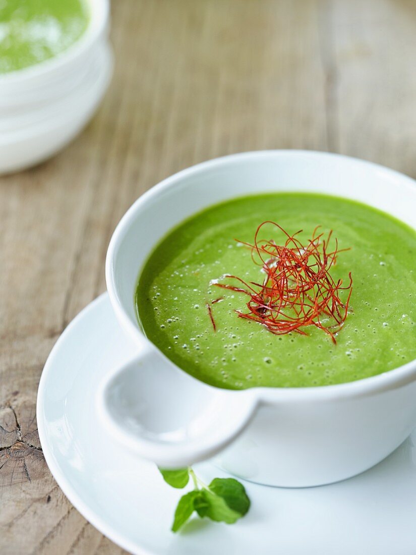 Cream of pea soup with chilli threads