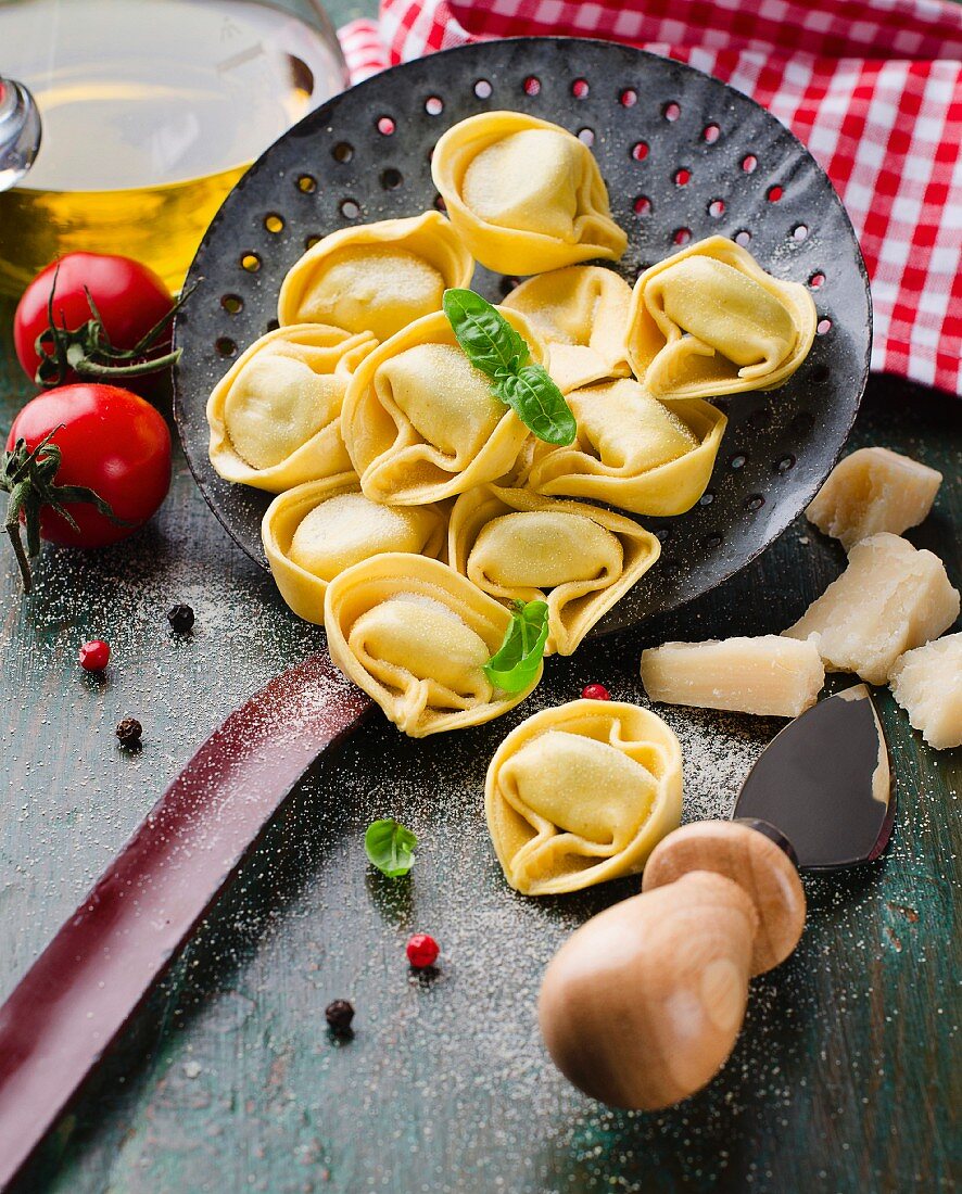 Tortellini, tomatoes, basil and parmesan