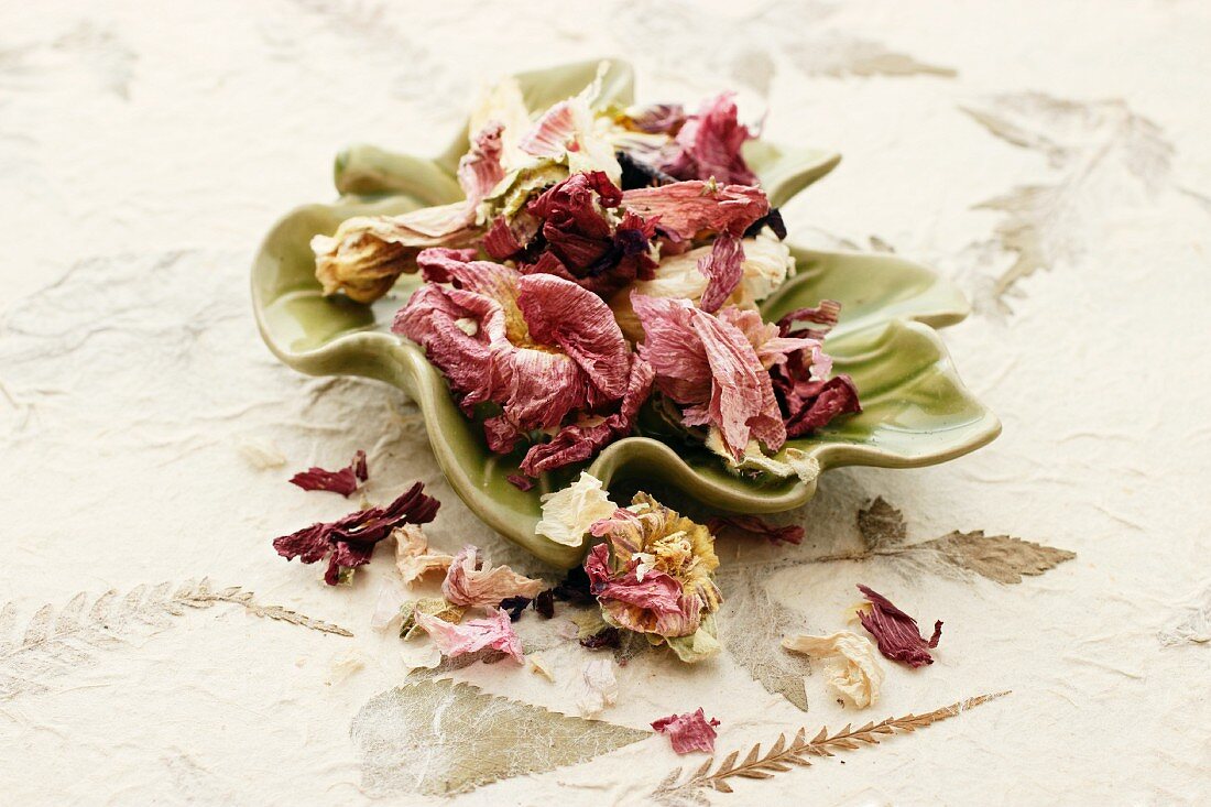 Dried okra flowers in a leaf-shaped dish