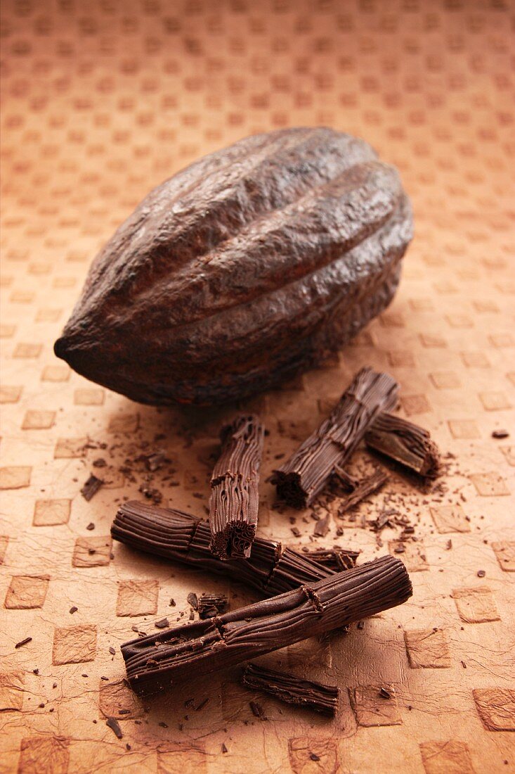 A cacao fruit and chocolate flake