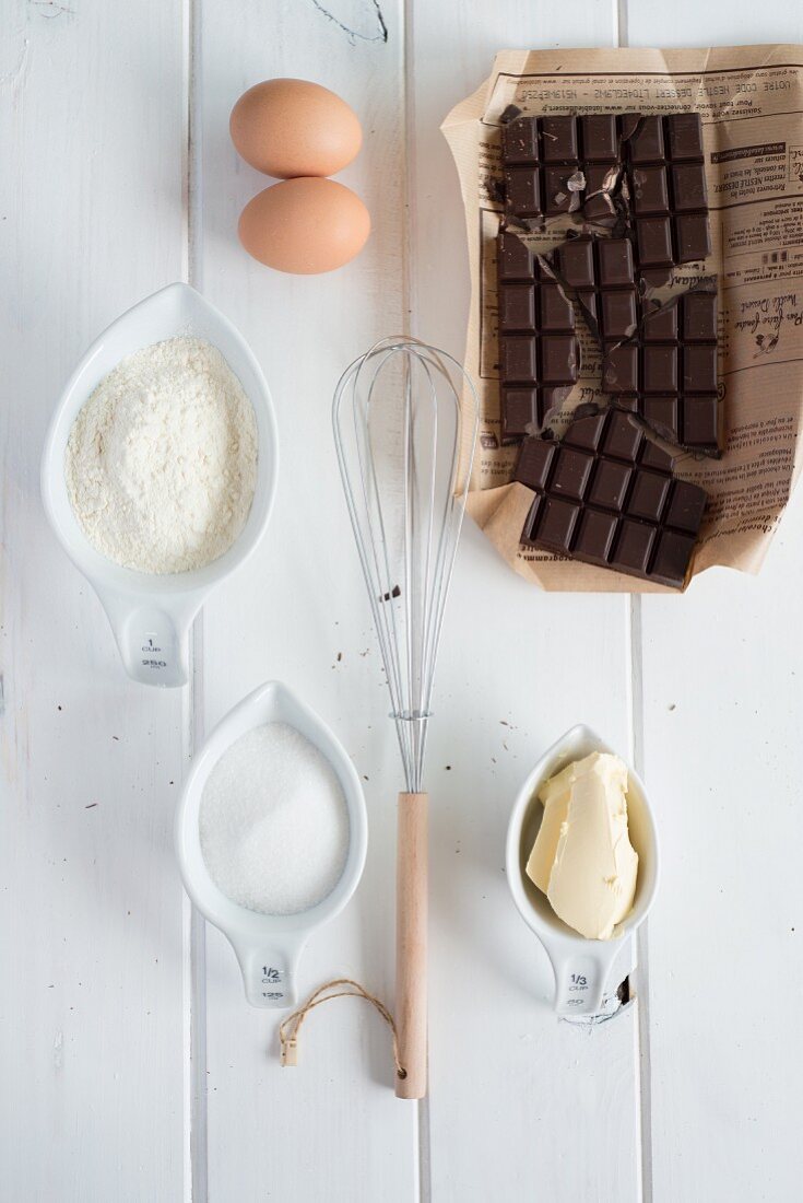 Baking Ingredients; Bowl of Flour; Eggs; Whisk
