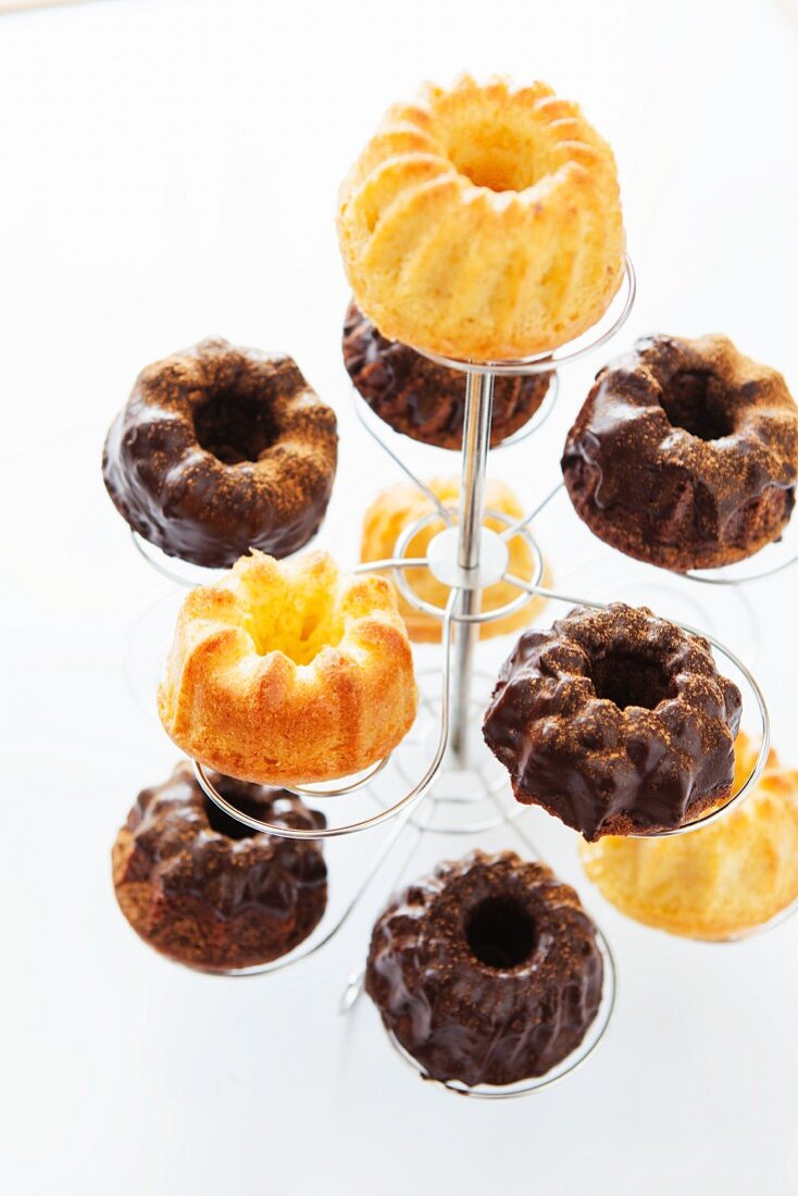 Various mini Bundt cakes on a cake stand