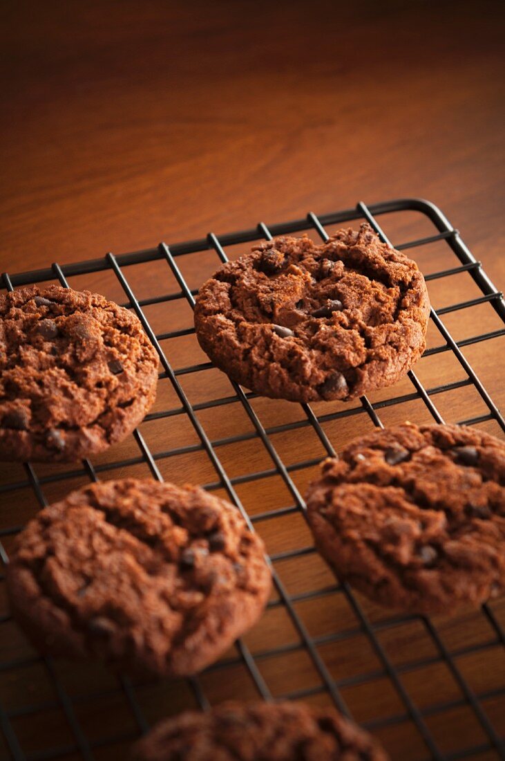 Chocolate cookies on a cooling rack