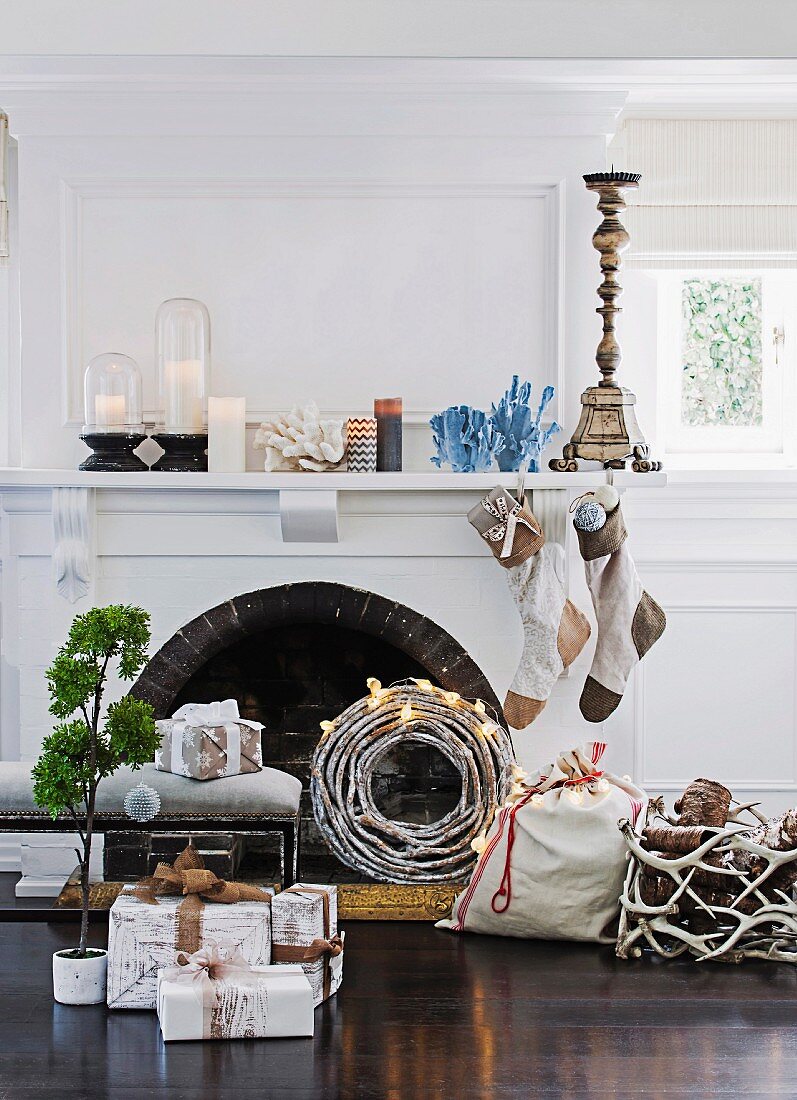 Festively decorated fireplace, hearth & mantelpiece in living room