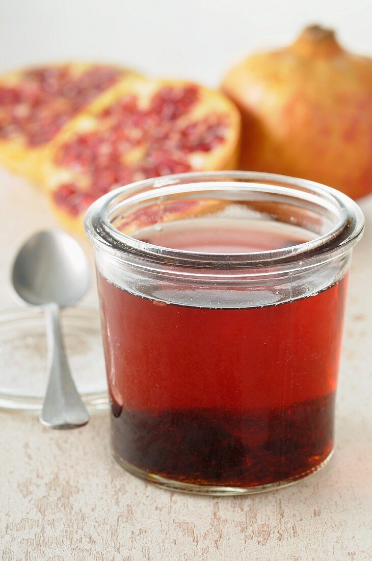 Pomegranate jelly and fresh pomegranates