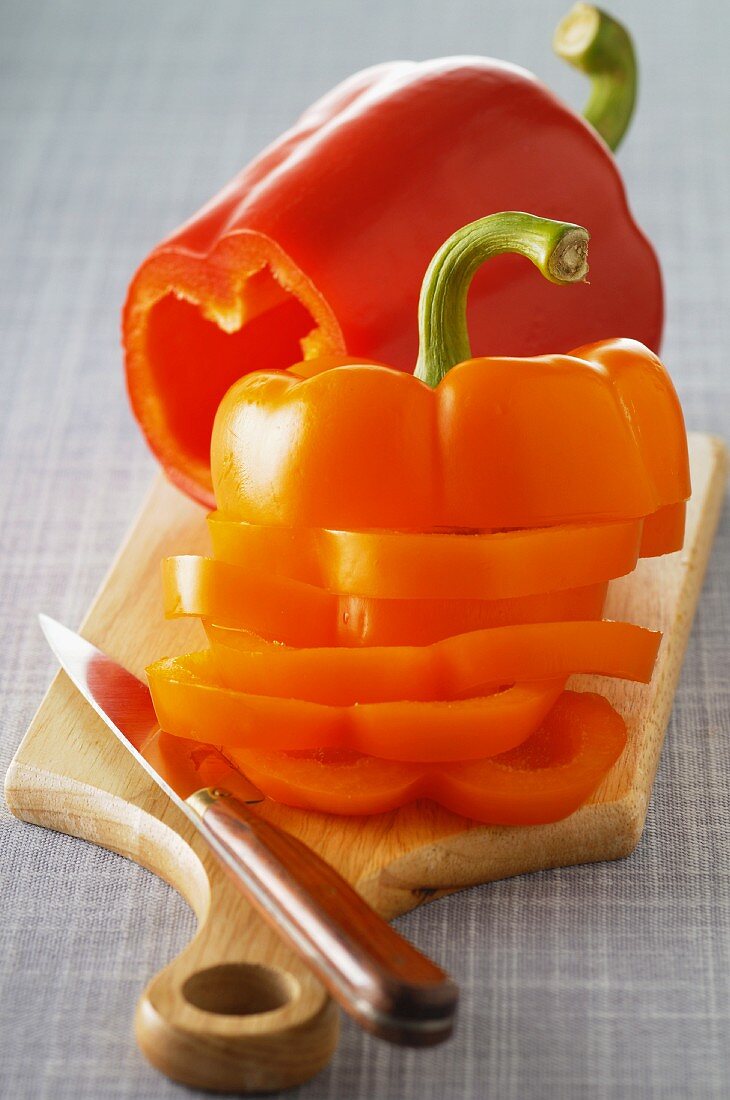 Sliced peppers on a chopping board