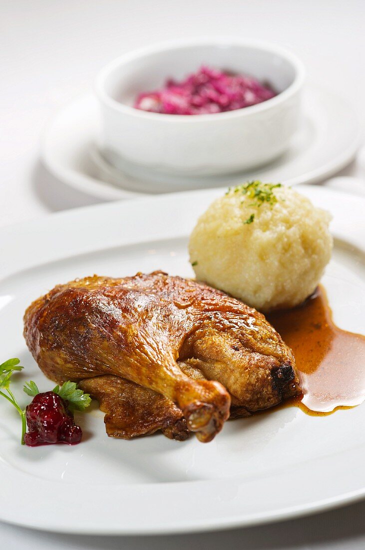 Duck with potato dumplings and red cabbage