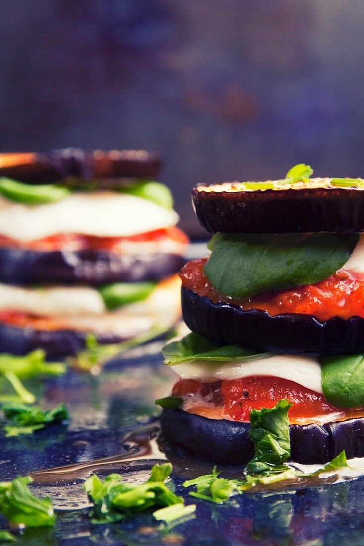 Aubergines with tomatoes, mozzarella and basil