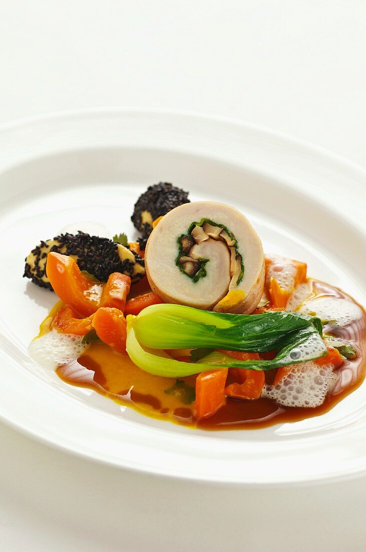 Saddle of rabbit on a carrot medley