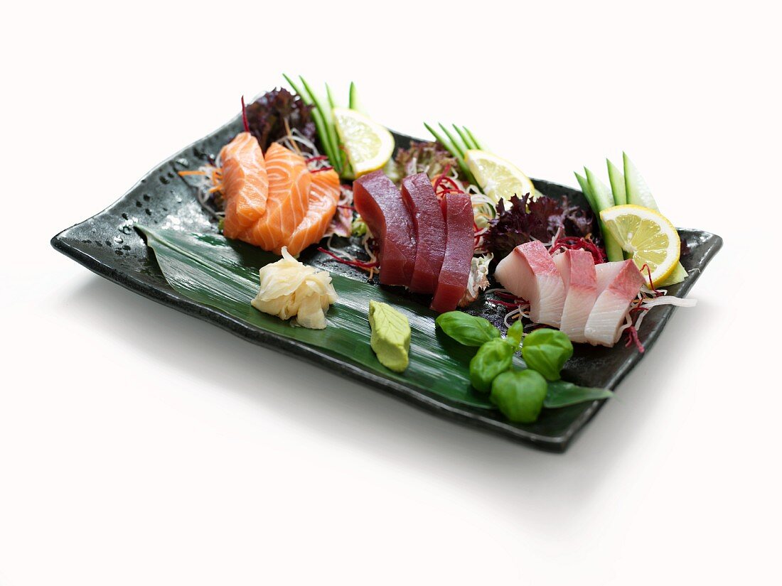 Raw fish with ginger and wasabi paste