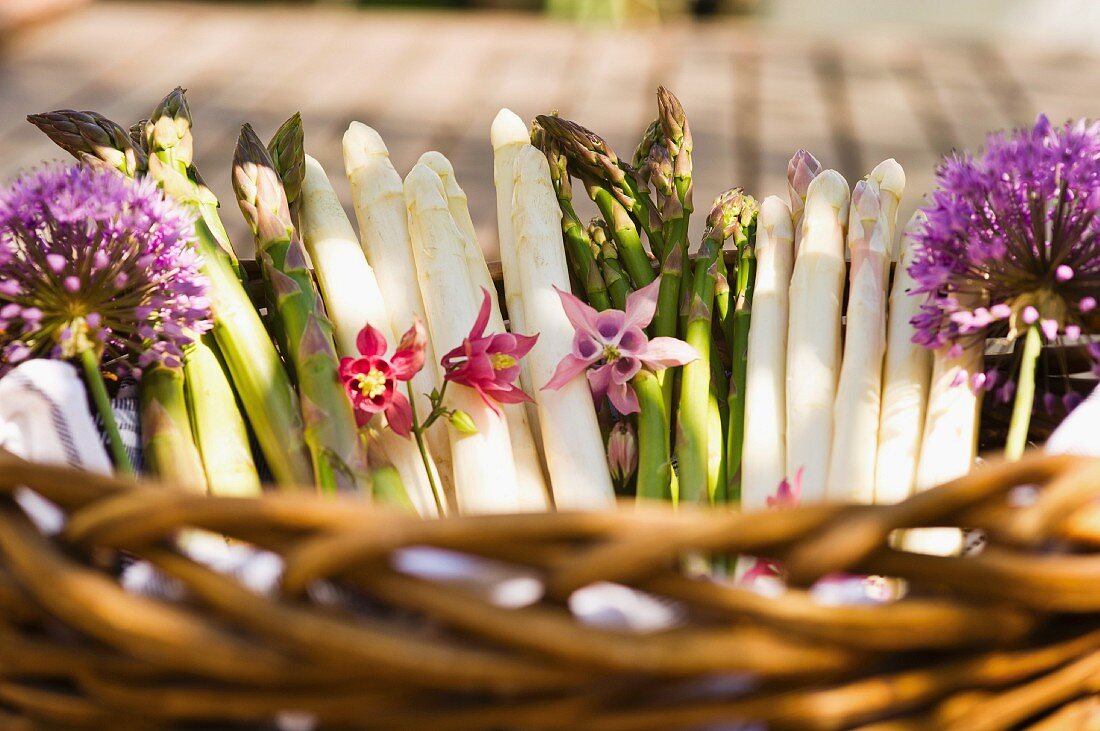 Various types of asparagus in a basket