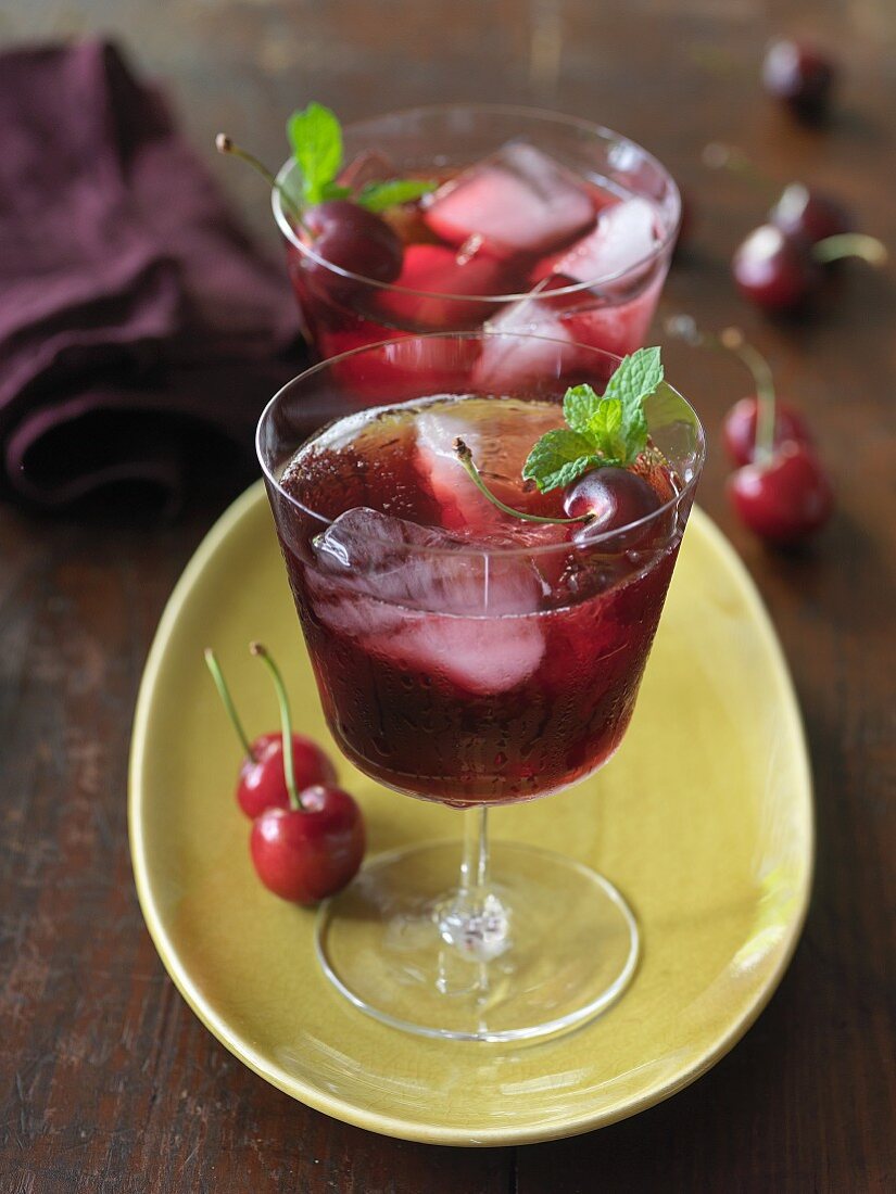Cherry juice with ice cubes