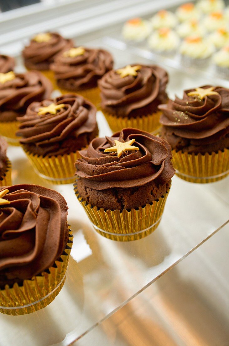 Chocolate fudge cupcakes decorated with stars
