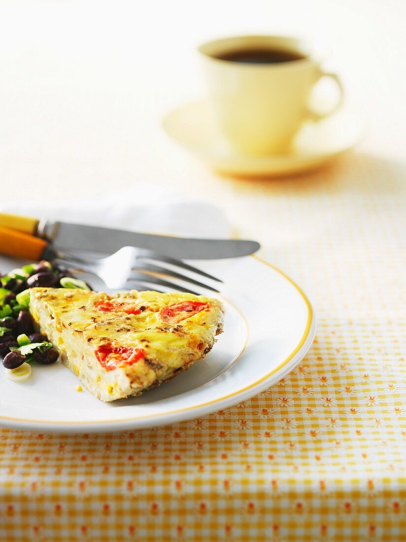 A slice of Tex-Mex frittata with black beans