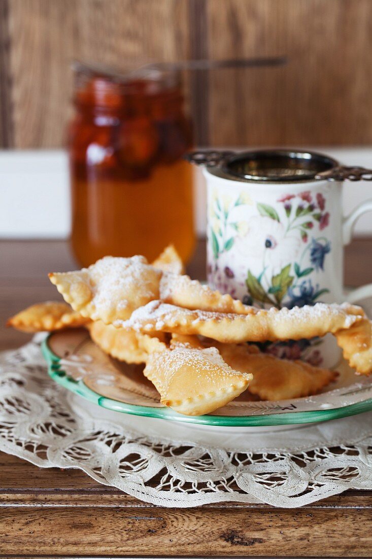 Khvorost (deep fried Russian pastries) with icing sugar