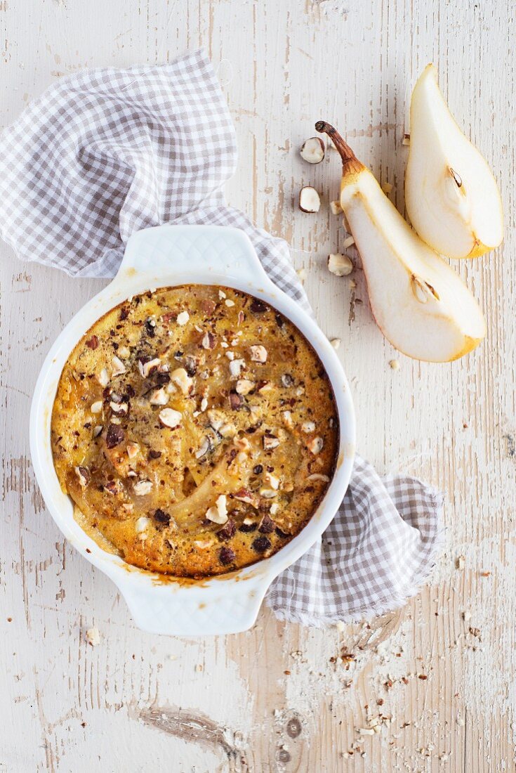 Apple and pear gratin in a baking dish