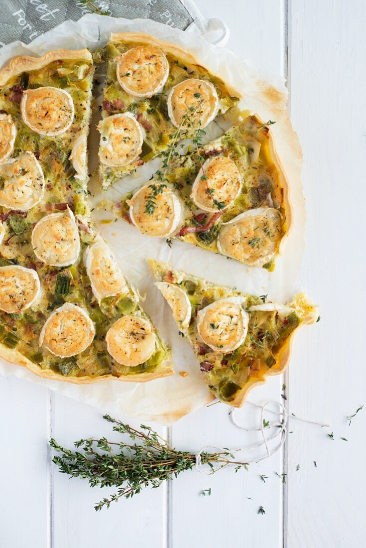 Leek tart with goats cheese and bacon, sliced