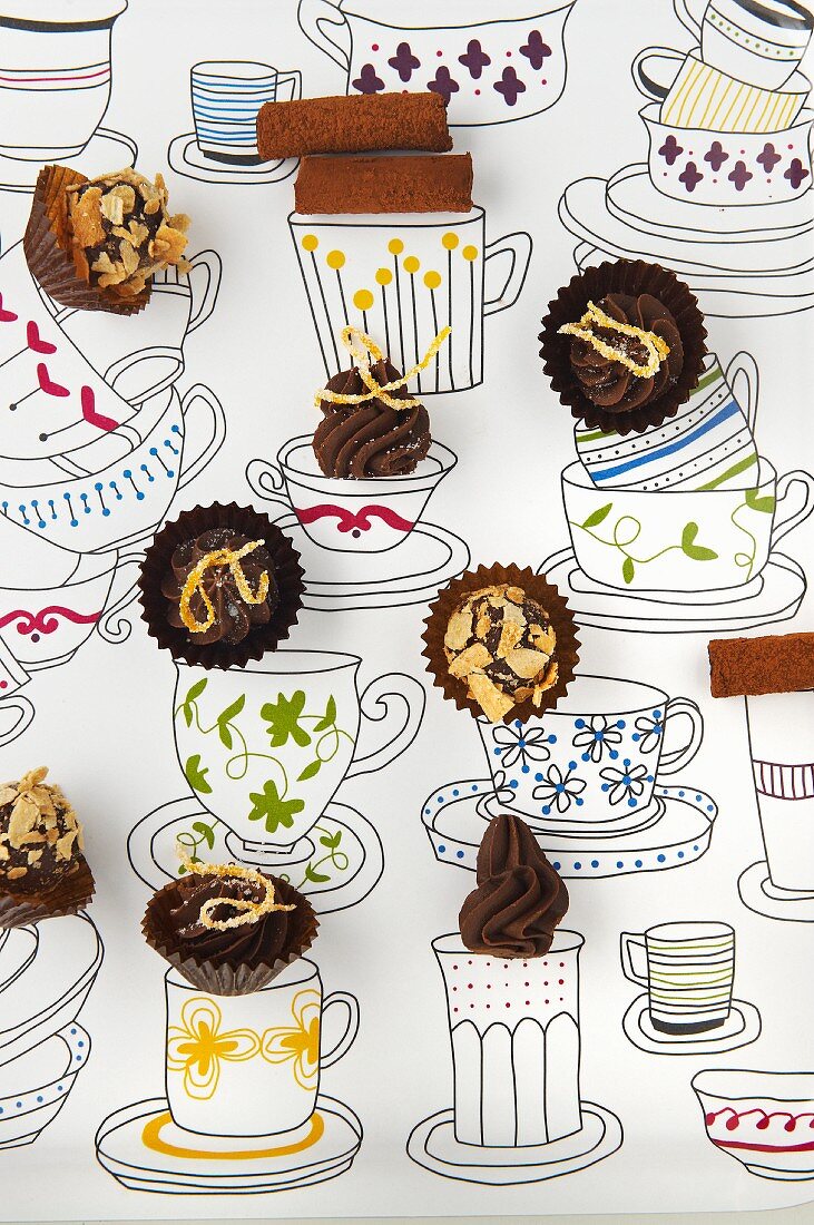 Quick chocolate pralines on a picture of cups