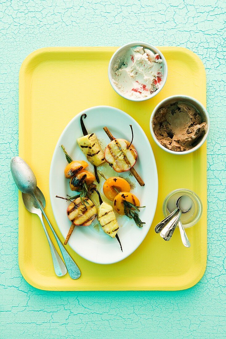 Grilled fruit skewers and ice cream