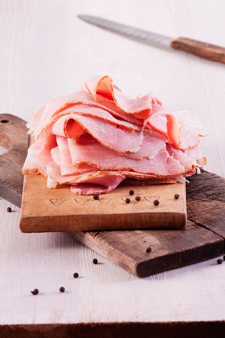 Slices of ham on a chopping board