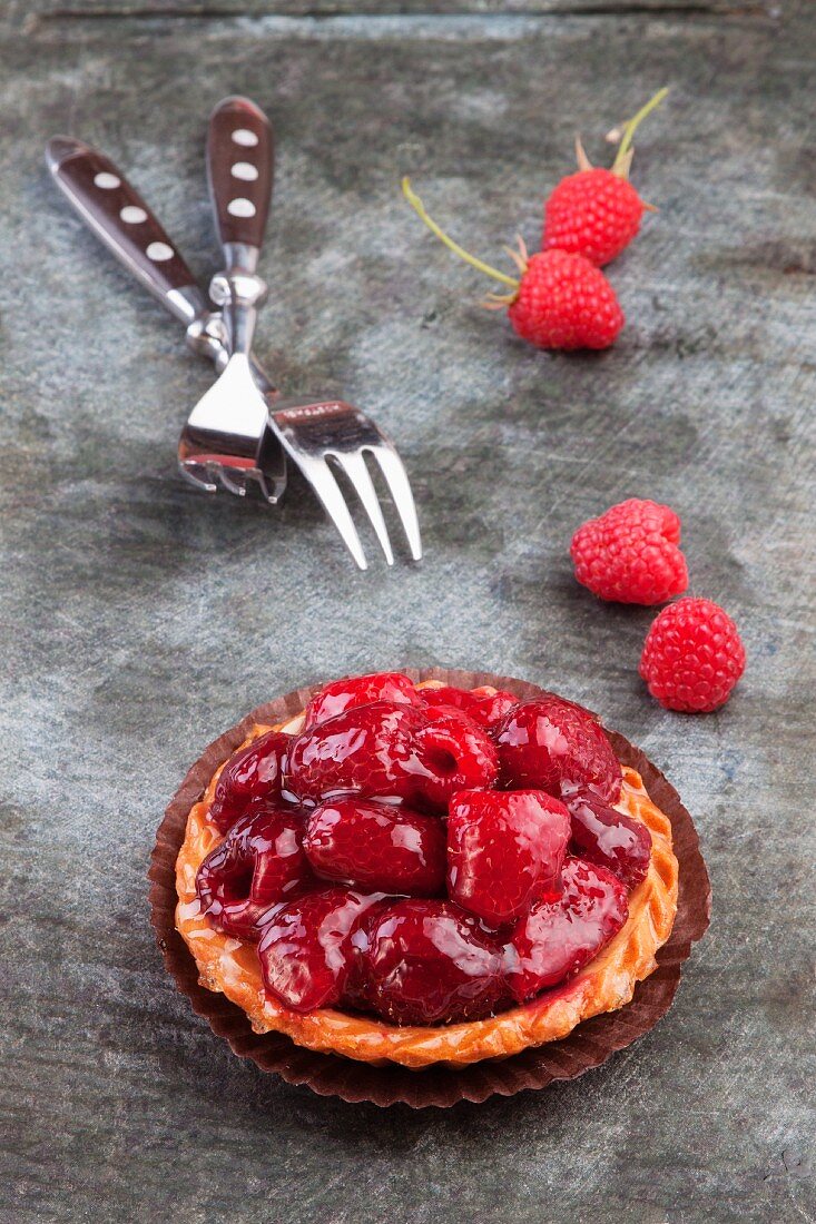 A mini tart with raspberries