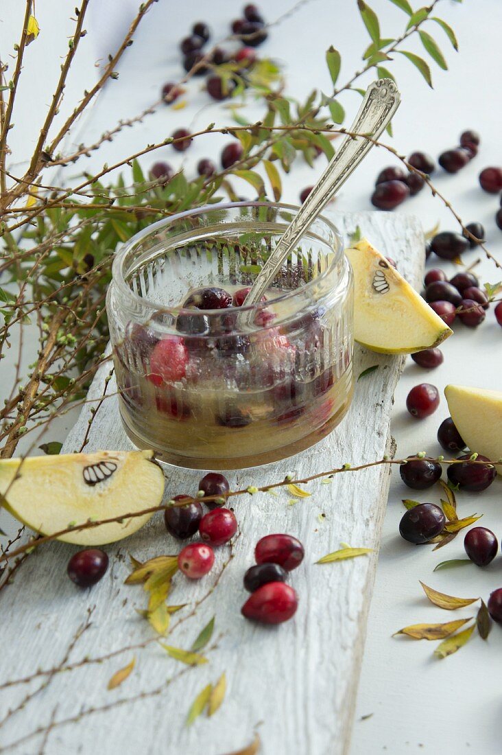 A jar of quince and cranberry jam