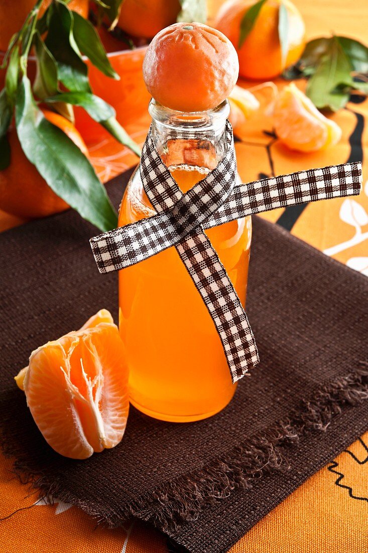 A bottle of home-made mandarin syrup
