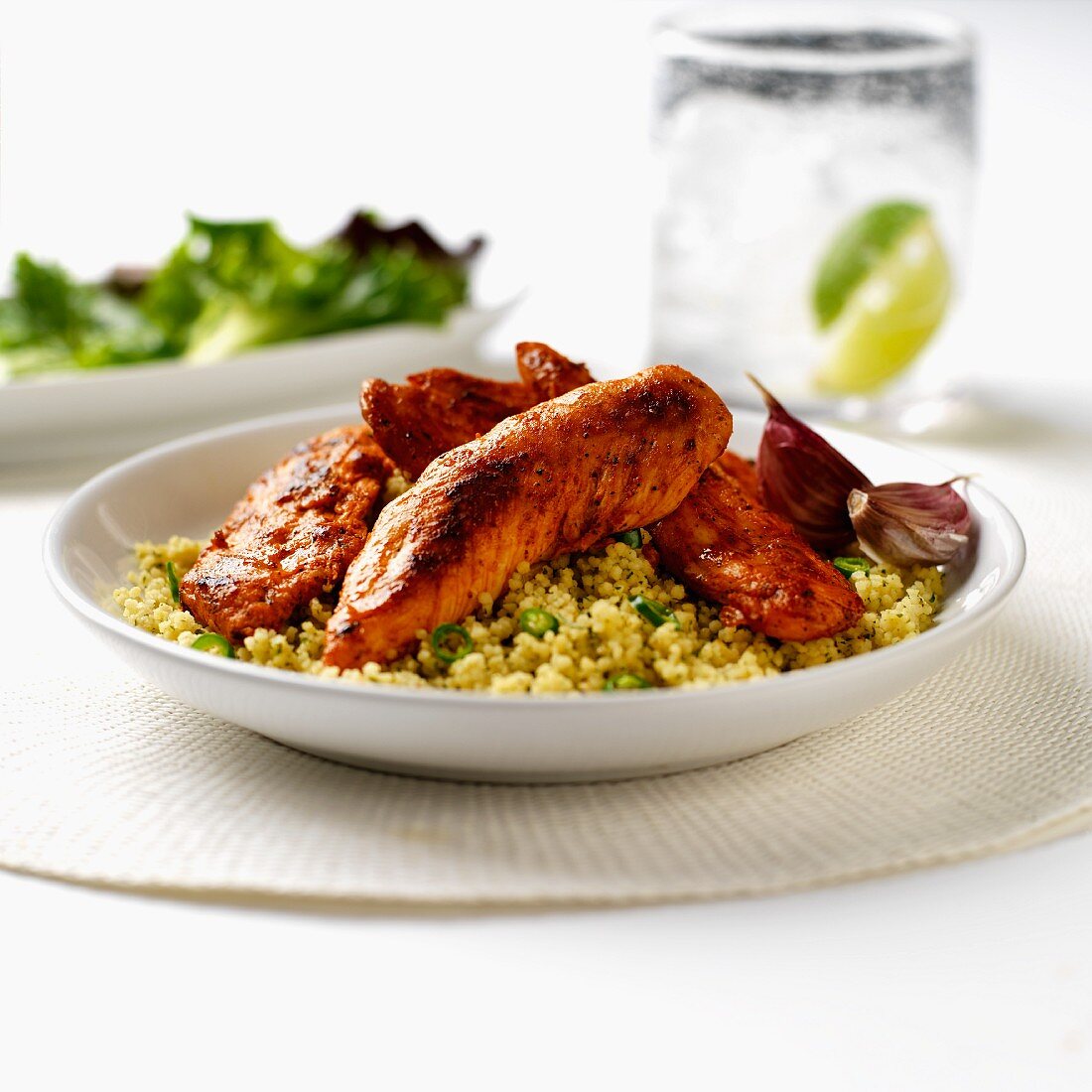 Chicken fillets with a chilli and garlic marinade on a bed of couscous