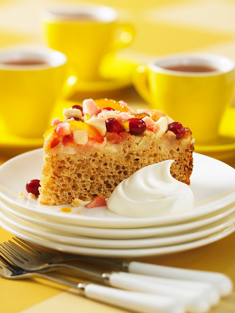 Apple and cranberry cake with cream