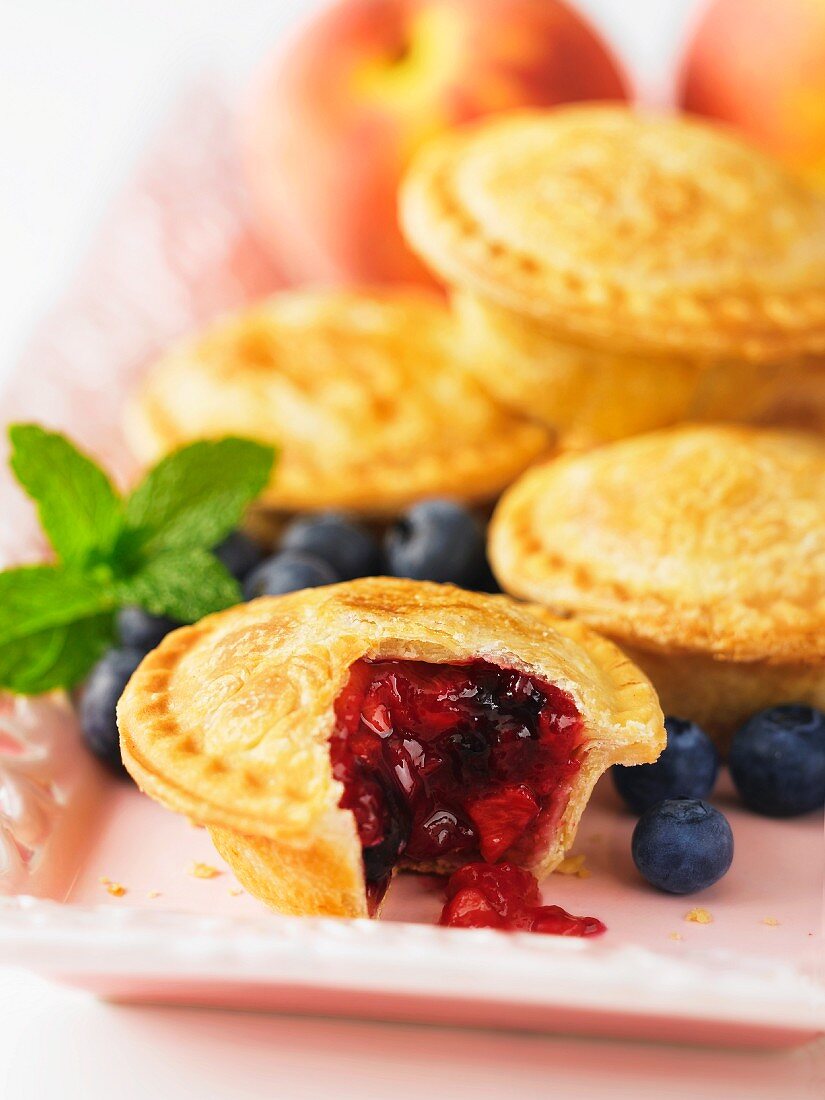 Mini peach and blueberry pies