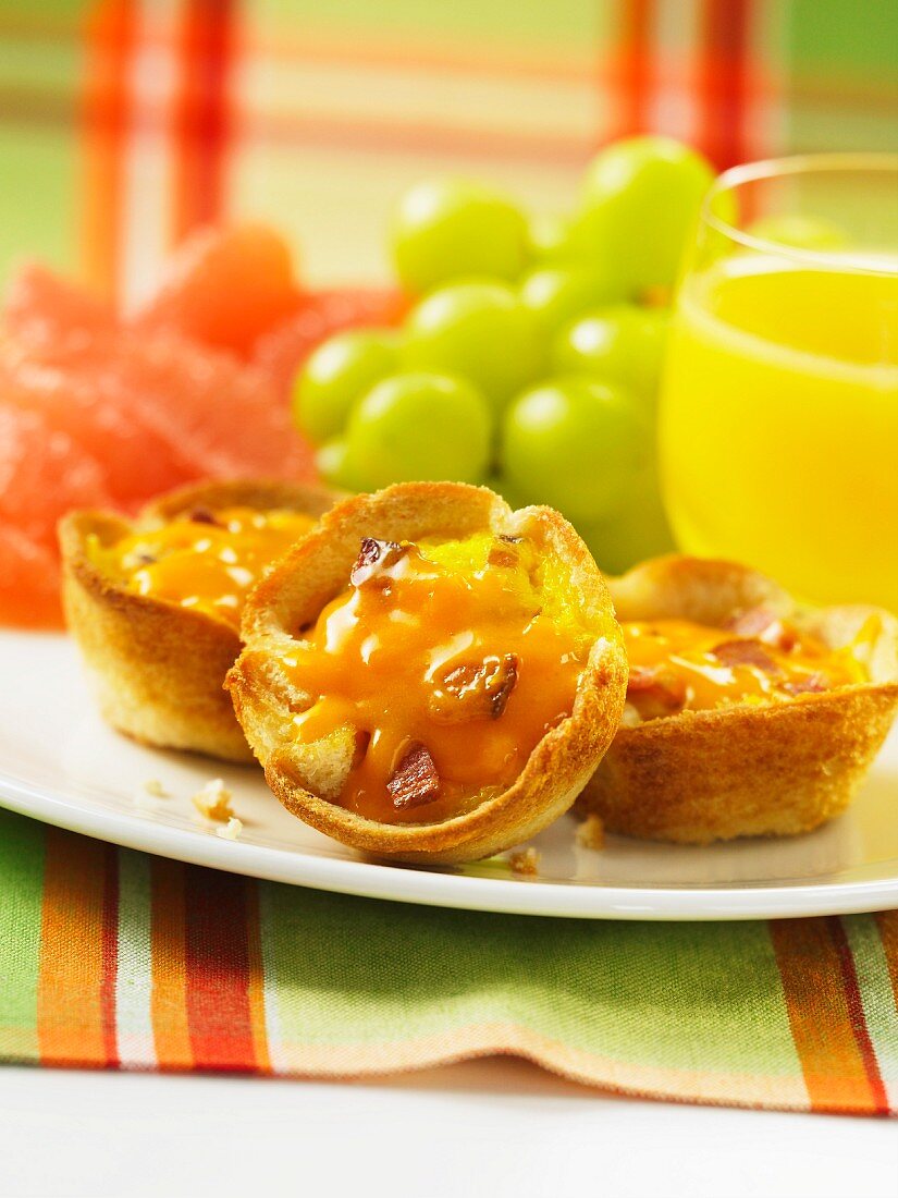 Scrambled egg and bacon tartlets