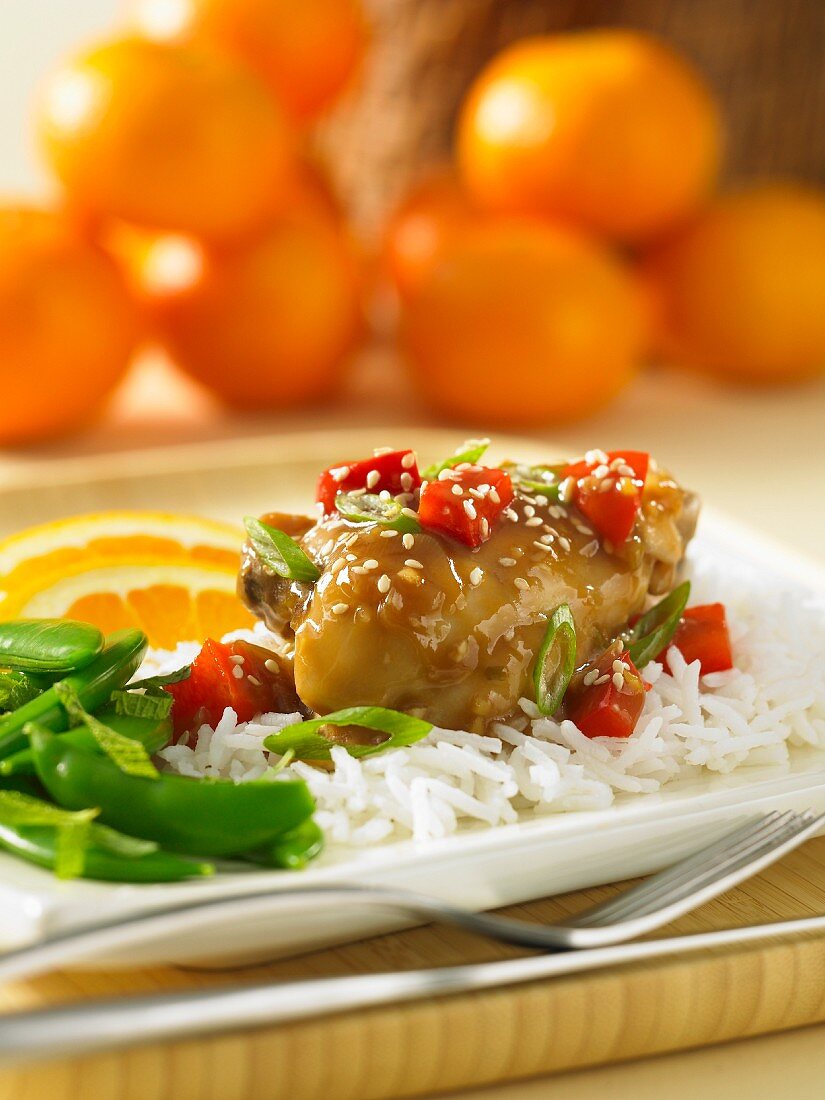 Huhn mit Hoisin-Orangen-Sauce auf Reis