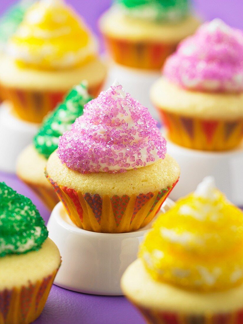 Cupcakes decorated with coloured sugar