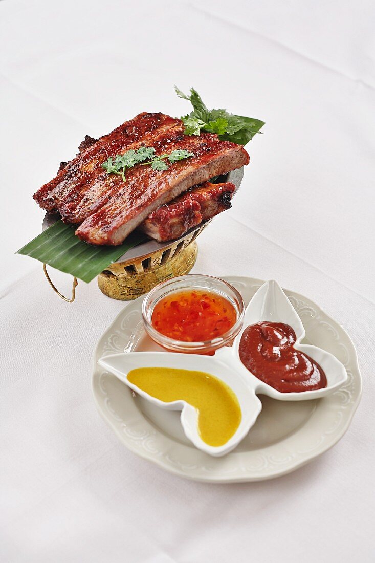 Spare ribs with a trio of sauces