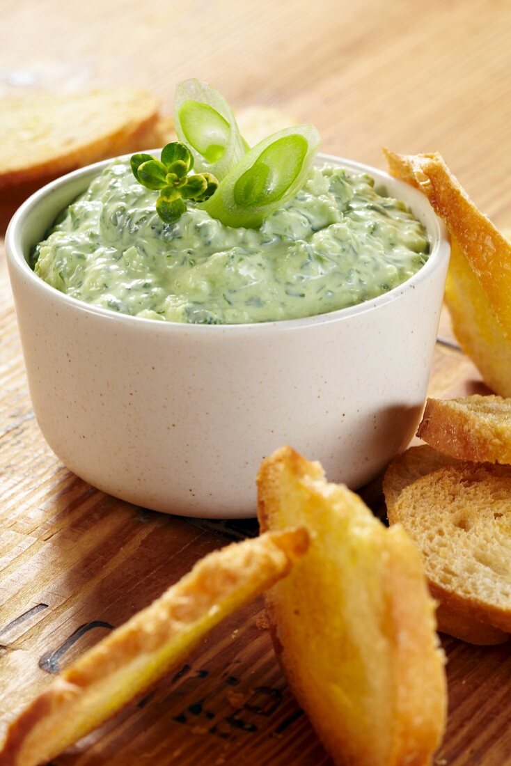 A wild garlic dip with white bread