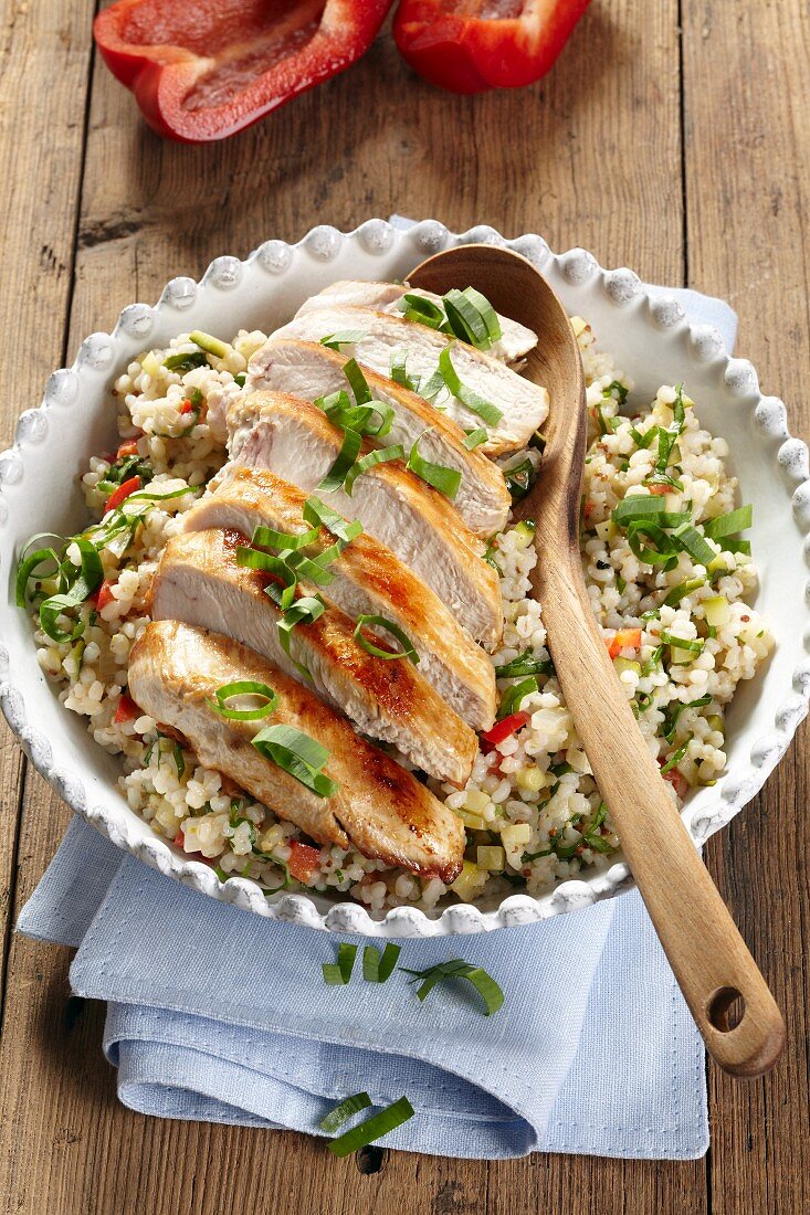 Pearl barley salad with wild garlic and chicken breast