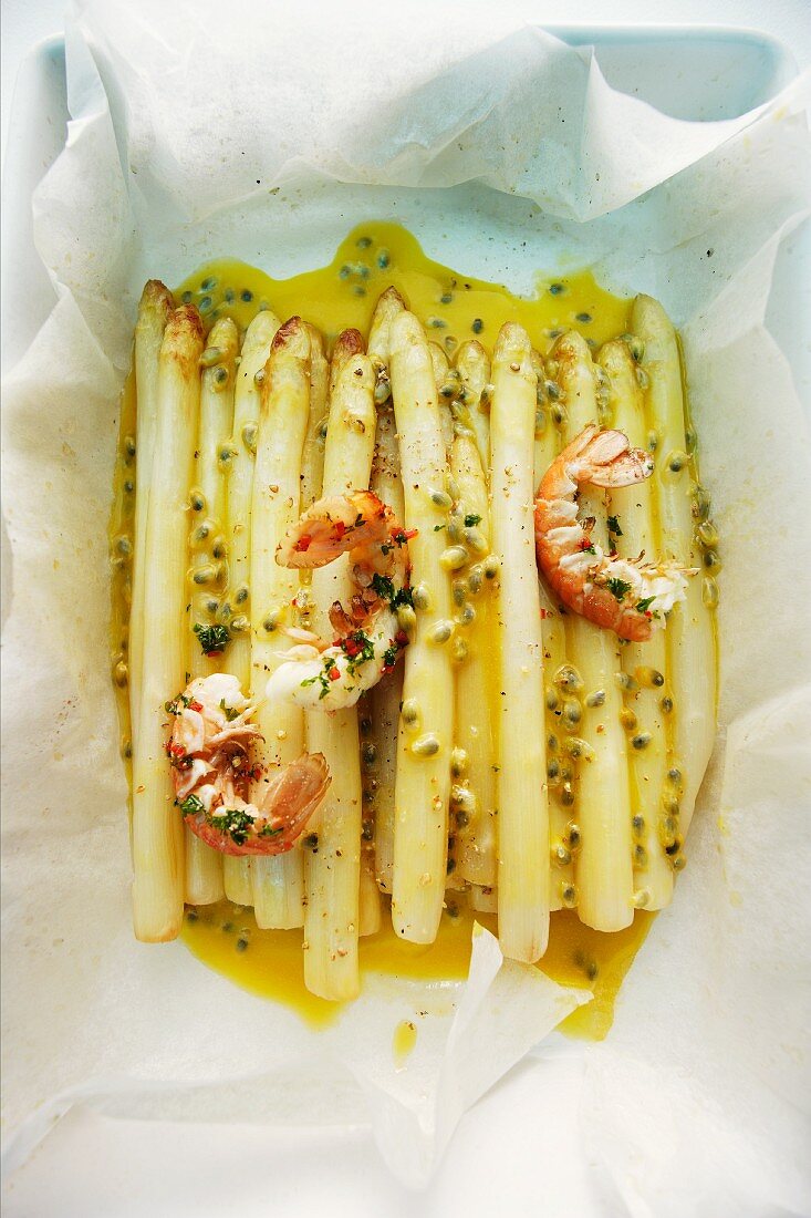 Asparagus braised in paper with fried langoustines