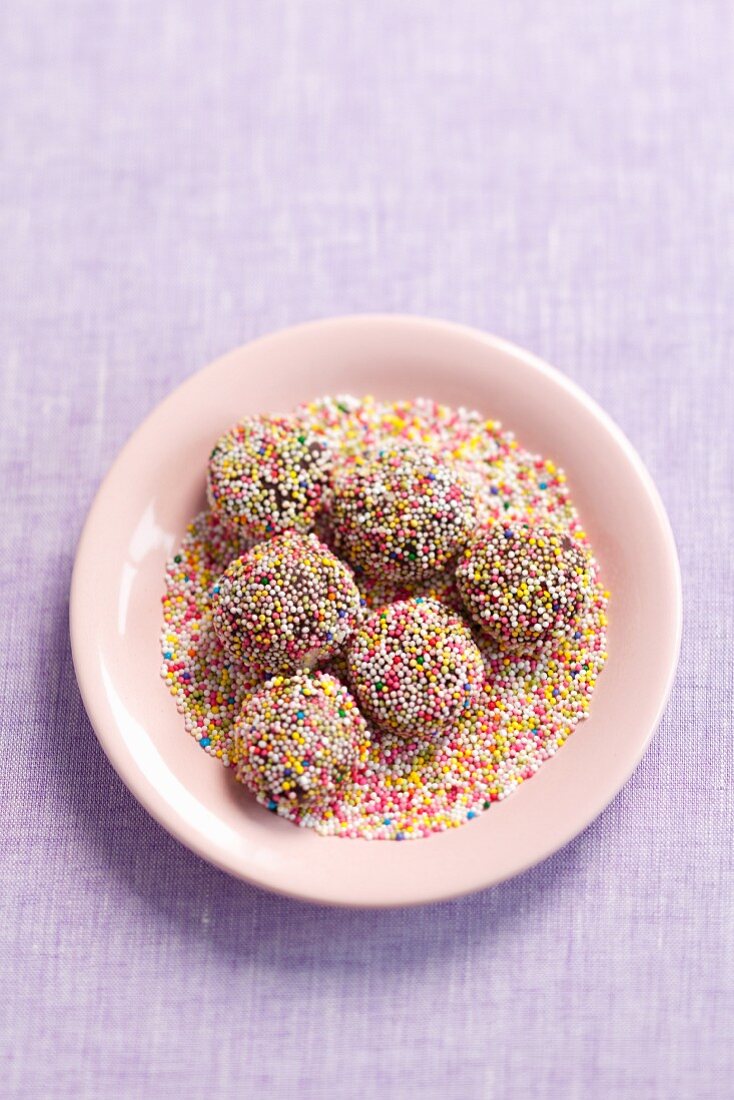 Chocolate truffles with colourful sprinkles