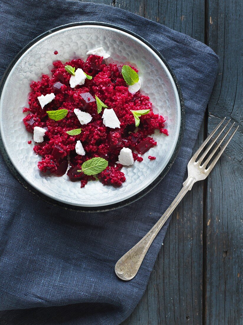 Couscous with beetroot, feta and mint leaves