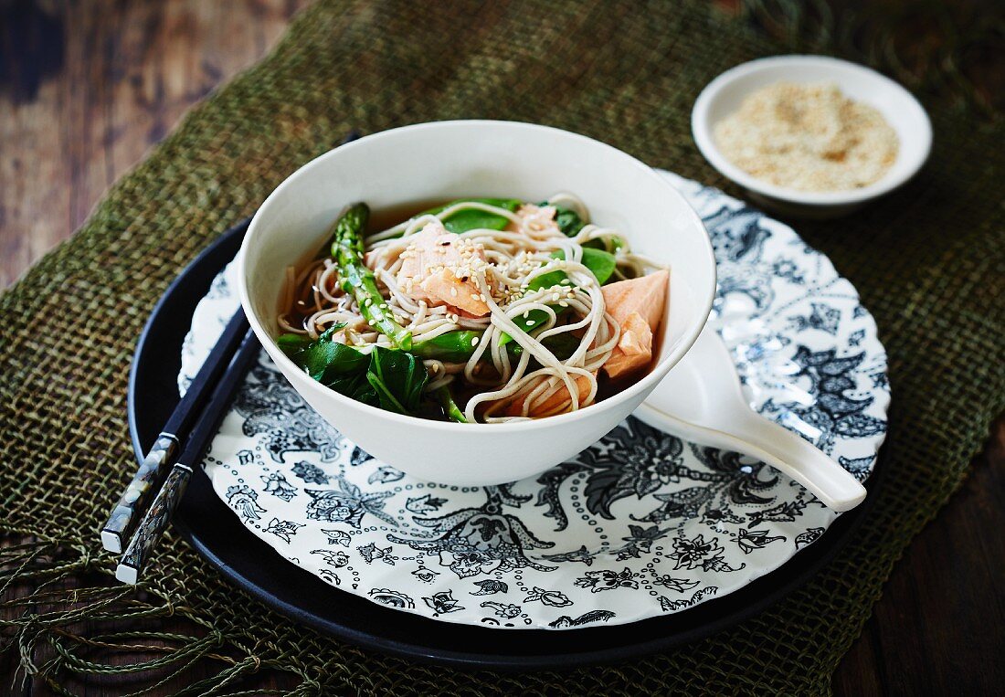 Soba noodle soup with salmon and spices (Asia)