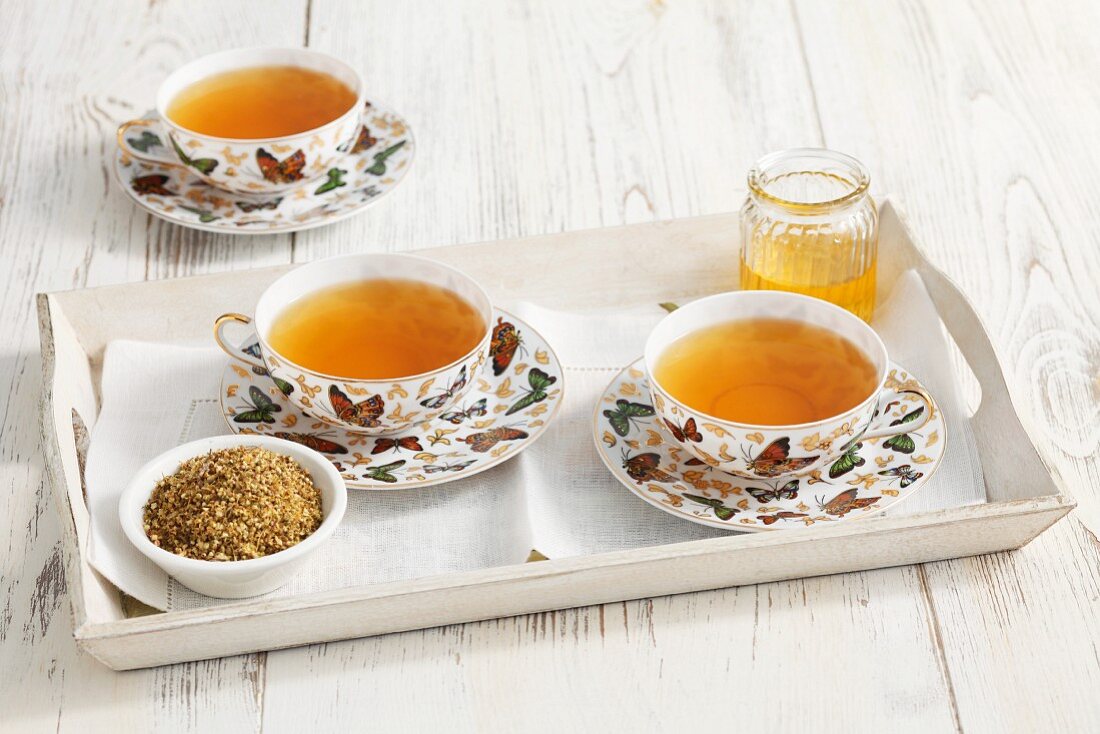 Meadowsweet tea and dried tealeaves