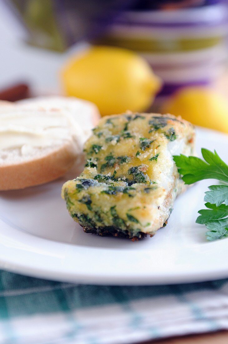 Fried cod fillet with parsley