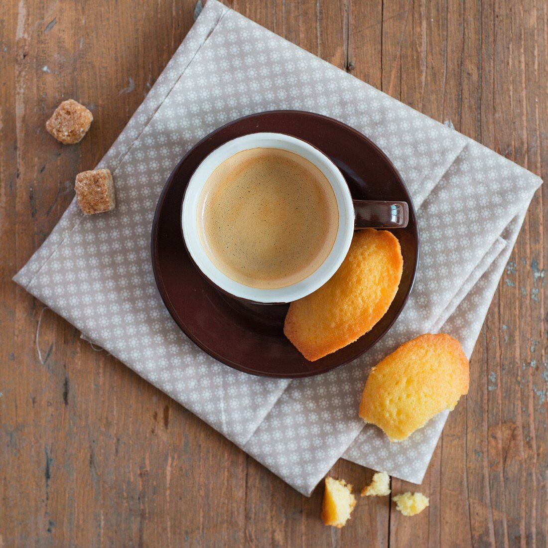 A cup of coffeee and madeleines