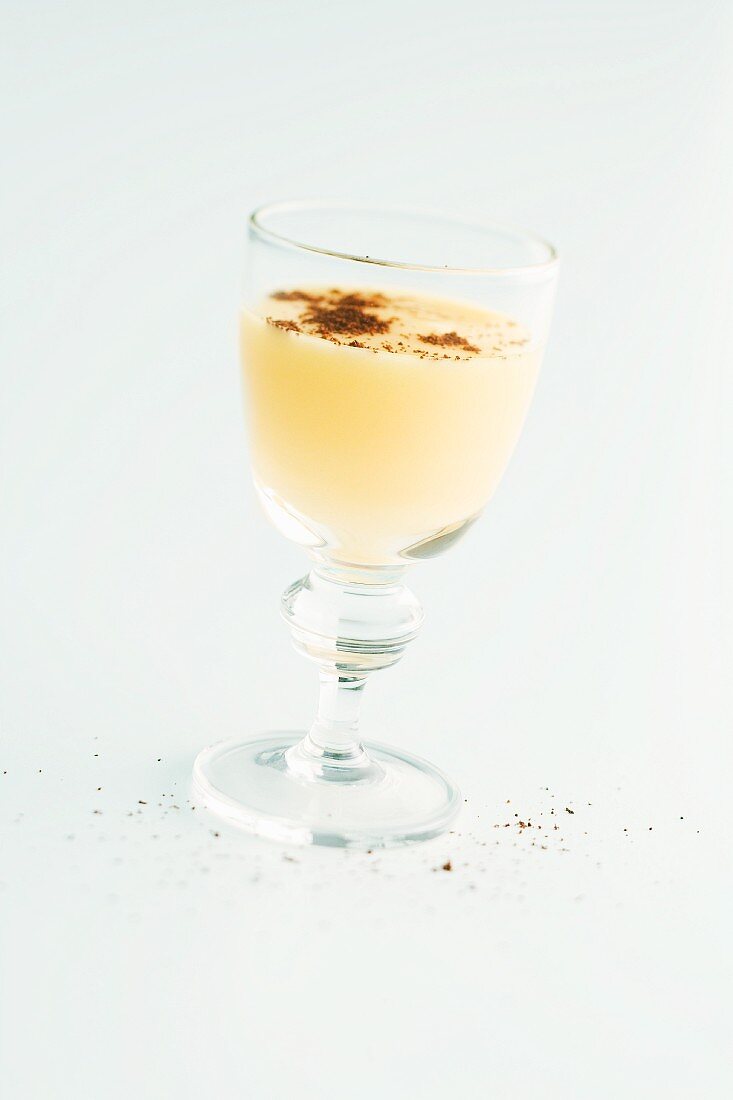 A cream dessert in a glass