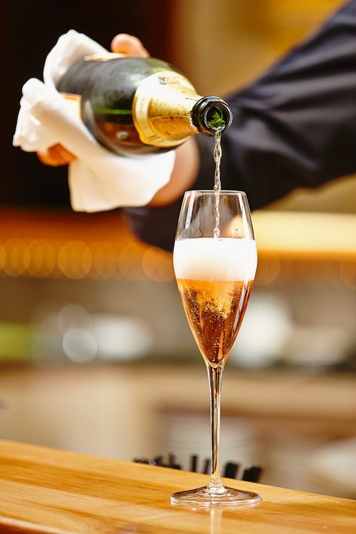 Pouring sparkling wine