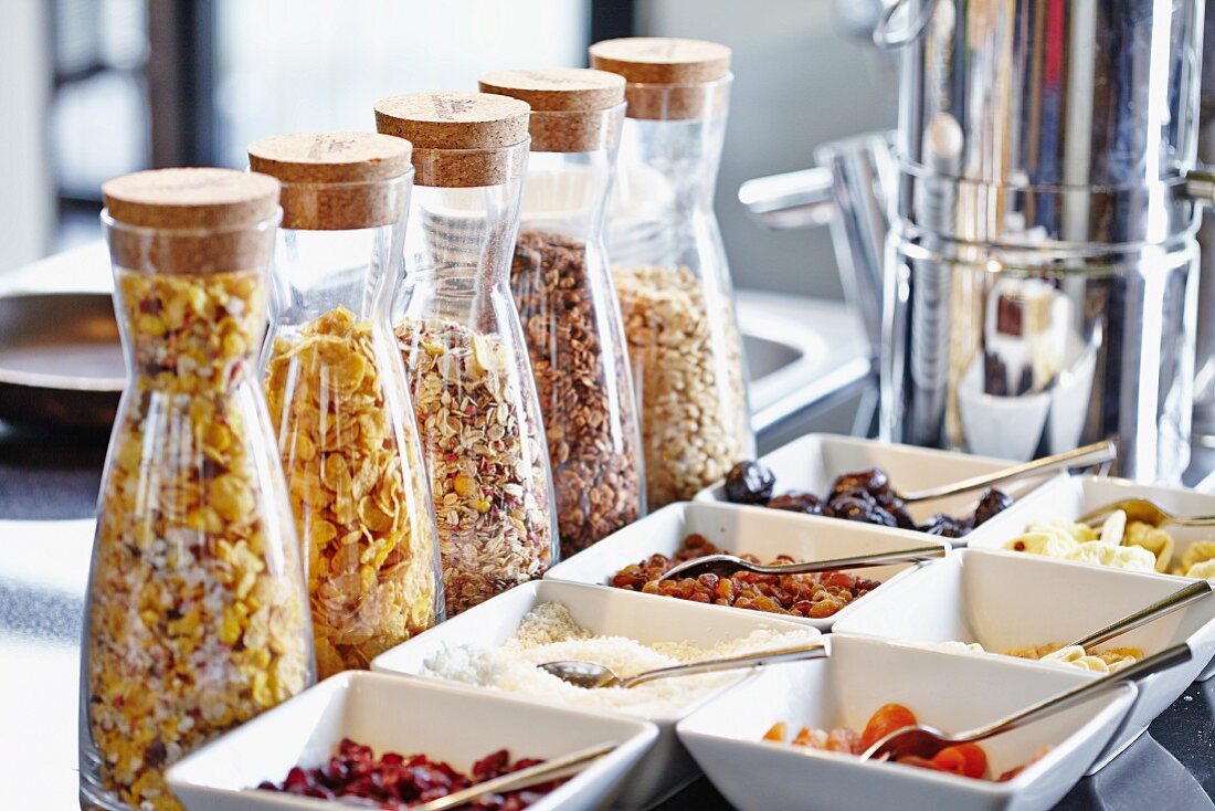 Muesli ingredients on a breakfast buffet