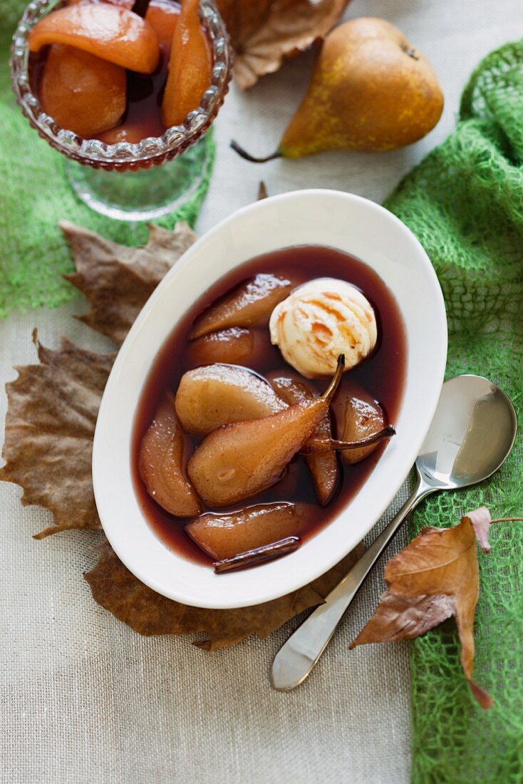 Poached pears with vanilla ice cream in red wine