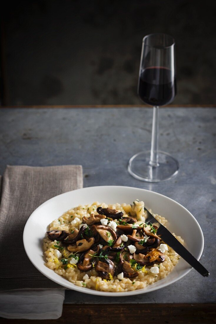 Mushroom risotto and a glass of red wine